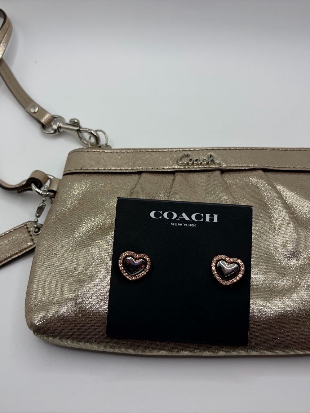 Coach Metallic Gold Wristlet and earrings